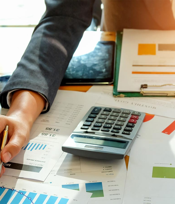Graph showing business growth and tax forms