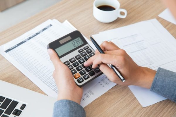 Financial advisor explaining taxes